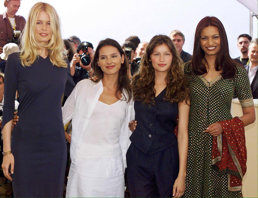 (From L to R) German top-model Claudia Schiffer, French actress Virginie Ledoyen, French top-model Laeticia Casta and Indian Miss World 1998 Diana Hayden pose for photographers during the l'Oreal photocall of the 52nd Cannes Film Festival 13 May 1999 in Cannes. (ELECTRONIC IMAGE)